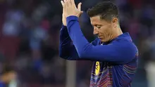 Robert Lewandowski mengucapkan salam perpisahan kepada fans Barcelona di Camp Nou. (JAIME REINA / AFP)