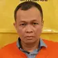 Mantan Pimpinan Cabang BNI Bengkalis yang ditangkap Polda Riau karena korupsi kredit usaha rakyat. (Liputan6.com/M Syukur)
