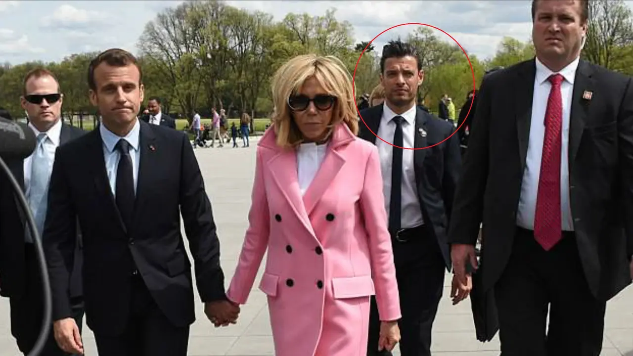 Paspampres ganteng di belakang Presiden Prancis Emmanuel Macron dan istrinya saat berkunjung ke Amerika Serikat. (AFP)
