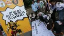 Tiga kelompok relawan dari ketiga paslon capres-cawapres menggelar aksi Damai Indonesia di Kawasan Patung Kuda, Jakarta, Selasa (23/4/2024). (Liputan6.com/Angga Yuniar)