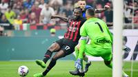 Rafael Leao memainkan peran krusial atas tiga poin yang didapat AC Milan pada laga derby. Ia memborong dua gol dan memberikan satu assist. (AFP/Isabella Bonotto)