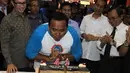 Jokowi bersama Priyo di HUT KPSI. Tampak lilin sedang ditiup oleh Ketua KPSI (Liputan6.com/Johan Tallo).