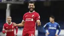 Foto pada 17 Oktober 2020 ini Mohamed Salah berselebrasi setelah mencetak gol pada pertandingan Liga Premier antara Everton vs Liverpool di stadion Goodison Park. Federasi Sepak Bola Mesir melaporkan, Jumat (13/11/2020), Mohamed Salah dinyatakan positif Covid-19. (Cath Ivill / Pool via AP, File)