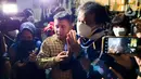 Roy Suryo usai menjalani pemeriksaan di Direskrimum Polda Metro Jaya, Jakarta, Kamis (28/7/2022). Roy Suryo telah menjalani pemeriksaan lanjutan sebagai tersangka kasus meme stupa Candi Borobudur. (Liputan6.com/Faizal Fanani)