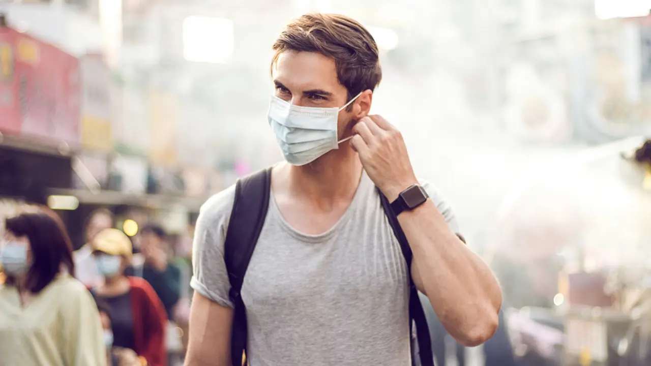 Memakai Masker saat Polusi.