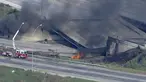 Tangkapan layar dari video yang disediakan oleh WPVI-TV/6ABC ini menunjukkan bagian I-95 yang runtuh dengan truk pemadam kebakaran di tempat kejadian di Philadelphia, Minggu (11/6/2023). (WPVI-TV/6ABC via AP)