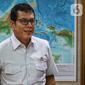 Menteri Pariwisata dan Ekonomi Kreatif Wishnutama saat menerima kunjungan jajaran Emtek dan SCM Group di Kantor Kemenpar, Jakarta, Jumat (8/11/2019). Kunjungan tersebut untuk membahas kerja sama di sektor media. (Liputan6.com/JohanTallo)