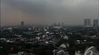 Suasana mendung di langit Jakarta pada Jumat (24/10/2014) (Liputan6.com/Faizal Fanani)