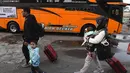 Pendaftaran program mudik gratis Kementerian Perhubungan pada Lebaran 2025 dibuka sejak 10 Maret hingga 23 Maret 2025. (merdeka.com/Arie Basuki)