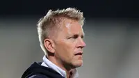 Heimir Hallgrimsson menjadi sosok di balik kesuksesan Timnas Islandia lolos ke putaran final Piala Dunia 2018. (KARIM JAAFAR / AFP)