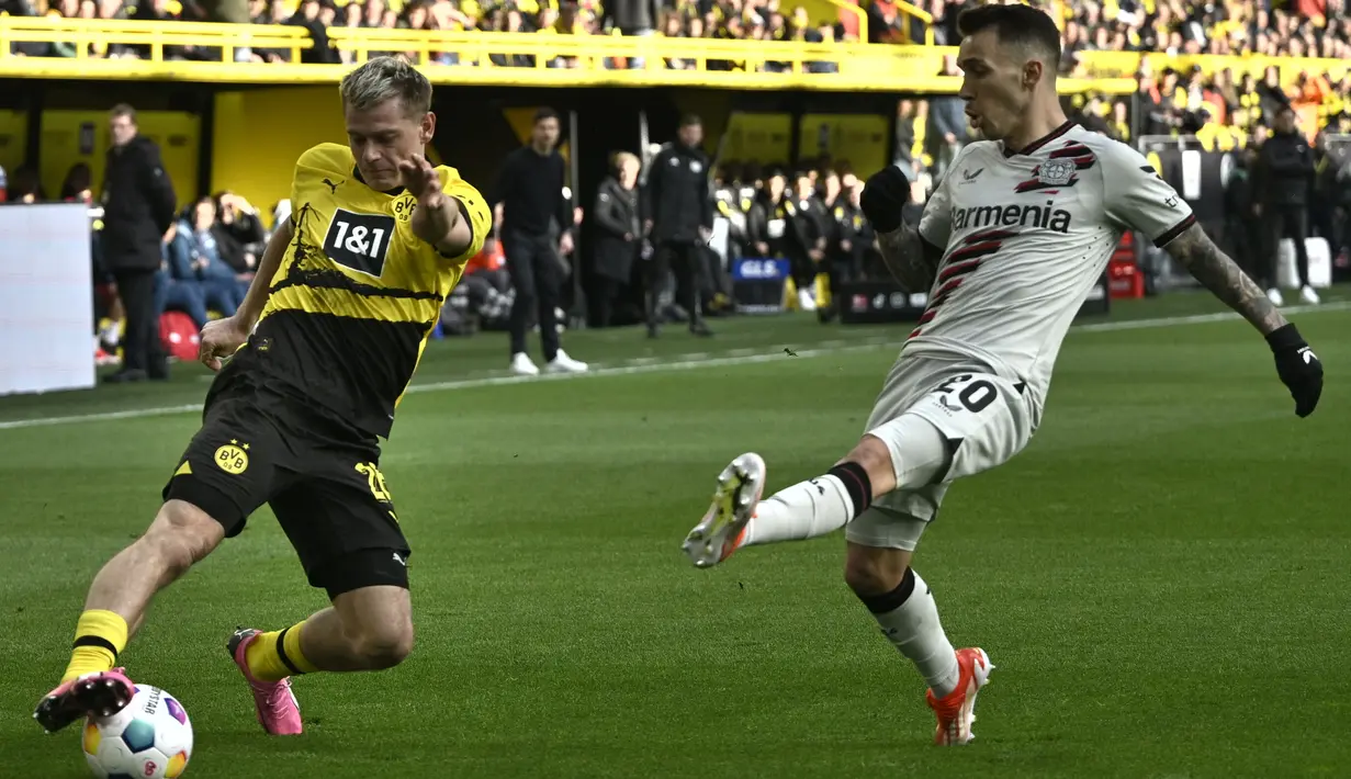 Sementara Dortmund gagal merebut posisi empat dari RB Leipzig dan tetap tertahan di urutan kelima dengan 57 poin, berselisih dua poin. (Sascha Schuermann / AFP)