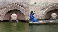 Ilmuwan berharap, patung Buddha yang menyembul dari permukaan waduk menjadi petunjuk 'harta karun' (Xinhua)