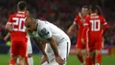 Bek Azerbaijan, Pavlo Pashayev, kecewa usai melakukan gol bunuh diri saat melawan Wales pada laga Kualifikasi Piala Eropa 2020 di Cardiff City Stadium, Cardiff, Jumat (6/9). Wales menang 2-1 atas Azerbaijan. (AFP/Geoff Caddick)