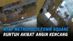 Nampak bagian depan mall runtuh dan pengunjung berteriak kepanikan.