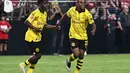 Tiga gol Dortmund dicetak oleh Donyell Malen (43' dan 44') dan Youssoufa Moukoko (71'). (AFP/Patrick T. Fallon)