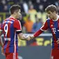 Thomas Mueller selebrasi dengan Robert Lewandowski ( REUTERS/Ina Fassbender )