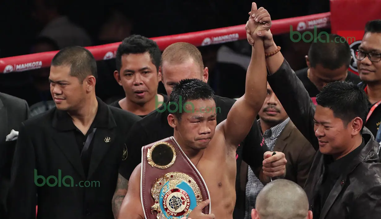 Daud Yordan berhasil mempertahankan gelar dan siap menuju tangga menjadi juara dunia. (Bola.com/Nicklas Hanoatubun)