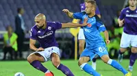 Gelandang Fiorentina, Sofyan Amrabat, dikaitkan dengan Manchester United pada bursa transfer musim panas 2023/2024. (AFP/Alberto Pizzolo)