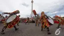 Salah satu anggota marching band TNI AD mengenakan kostum harimau saat pembukaan Pameran Alutsista TNI di kawasan Monas, Jakarta, Jumat (12/12/2014). (Liputan6.com/Faizal Fanani)