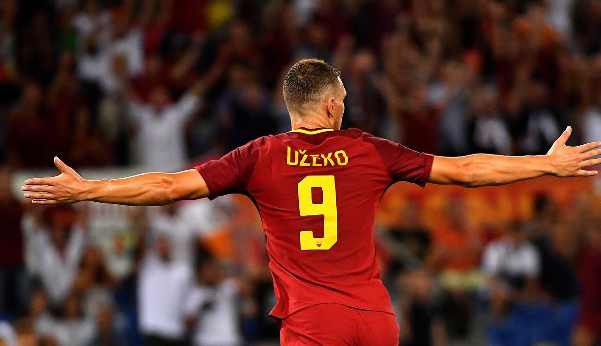 3. Edin Dzeko (AS Roma) - 7 Gol. (AFP/Alberto Pizzoli)
