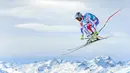 Atlet Prancis, Adrien Theaux, beraksi saat latihan di nomor downhill final Piala Dunia Ski Alpine di St. Moritz, (15/3/2016). (AFP/Fabrice Coffrini)