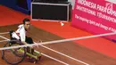 Pebulutangkis Banten, M Subhan saat melawan Chandra Yuda (DKI Jakarta) saat turun di kelas RR2 Indonesia Para Games Invitational Tournament 2018 di Istora Senayan, Jakarta, Rabu (27/6). (Liputan6.com/Helmi Fithriansyah)