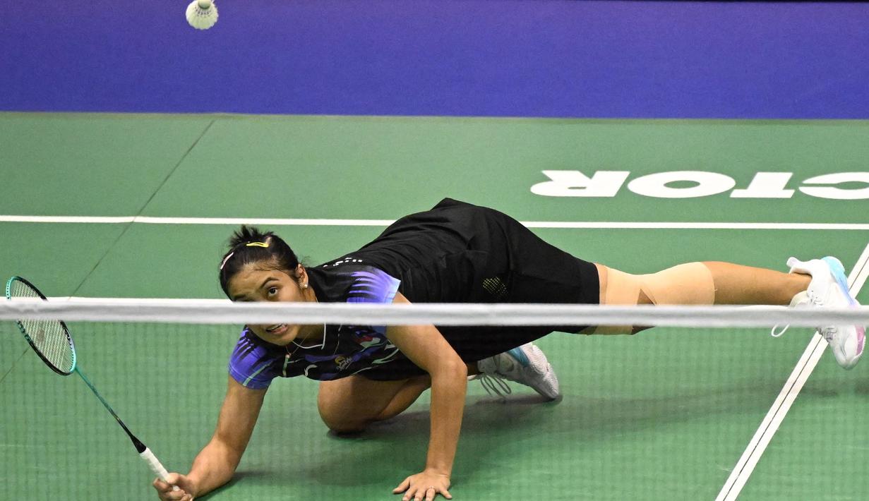 Gregoria Mariska Tunjung unggul dua set langsung (21-9, 21-18). (Peter PARKS/AFP)