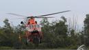 Helikopter Basarnas yang telah membawa jenazah dari KRI Banda Aceh tiba di Lanud Iskandar, Kalteng, Rabu (7/1/2015). Pelaksanaan operasi yang sudah memasuki hari ke-11 sudah mengevakuasi sebanyak 41 jenazah.(Liputan6.com/Andrian M Tunay)