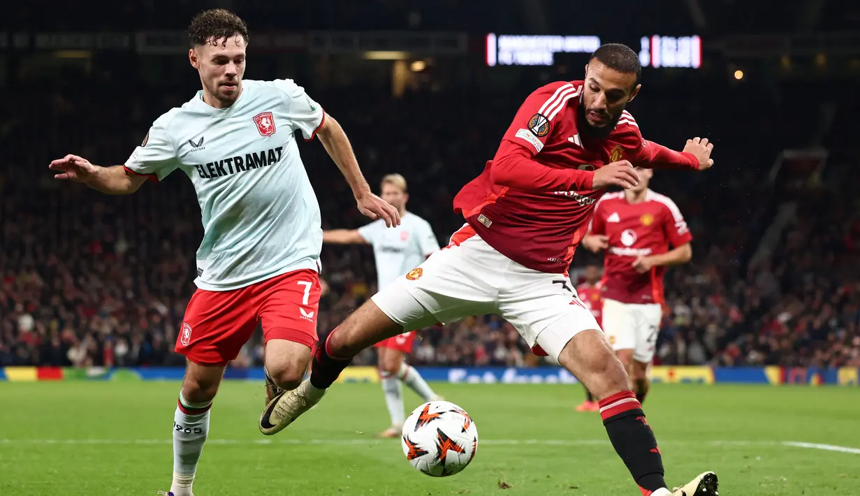 Hasil imbang membuat Manchester United dan Twente berada di papan tengah klasemen sementara League Phase Liga Europa 2024/2025. (Darren Staples/AFP)