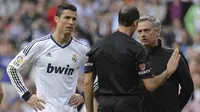 Jose Mourinho menghabiskan tugas tiga musim di Santiago Bernabeu pada awal 2010-an. Ia mewarisi tim superstar, dengan Cristiano Ronaldo menjadi permata mahkotanya. Ronaldo berada dalam performa terbaiknya di bawah Mourinho, menyumbang 168 gol dan 49 assist hanya dalam 164 laga. (AFP/Dani Pozo)