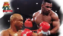 Artikel 10 tahun Bola.com - George Foreman, Mike Tyson (Bola.com/Adreanus Titus)