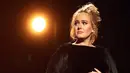 Adele kembali datang dengan kabar menyedihkan untuk para penggemarnya. Setelah pembatalan konser yang membuat fansnya sangat kecewa, kini Adele punya rencana lainnya. (AFP/Bintang.com)