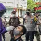Wakapolda Jatim Brigjen Polisi Slamet Hadi Supraptoyo meninjau penerapan PPKM Darurat di Kota Surabaya. (Dian Kurniawan/Liputan6.com)