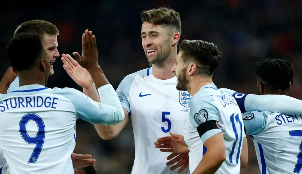 Pemain Inggris merayakan gol yang dicetak Gary Cahill ke gawang Skotlandia dalam laga Grup F Kualifikasi Piala Dunia 2018 di Stadion Wembley, Jumat (11/11/2016) waktu setempat. (Reuters/Dylan Martinez)
