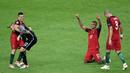Ekspresi pemain Portugal sesaat setelah meraih gelar juara Piala Eropa 2016 di Stade de France, Saint-Denis, Senin (11/7/2016) dini hari WIB. (AFP/Philippe Lopez)