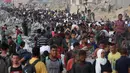 Mahmud Bassal menyebut dari 31 korban tewas, sekitar lima orang di antaranya tewas ketika sedang mengantre bantuan di wilayah Jalur Gaza bagian selatan pada Jumat (20/6/2025). (Omar AL-QATTAA/AFP)