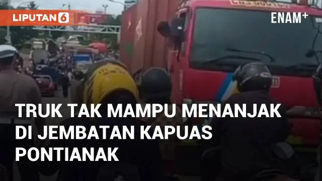 Truk tidak mampu menanjak di atas Jembatan Kapuas 2, Kubu Raya. Pengguna jalan diminta berhati-hati saat melintas di area tersebut