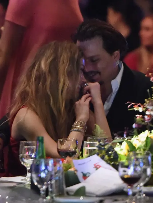 Uang sejumlah $7 Juta yang diberikan untuk Amber kabarnya akan didonasikan untuk pihak yang membutuhkan. Niat baik ini ternyata telah disepakati keduanya di awal proses cerai mereka beberapa bulan silam. (AFP/Bintang.com)