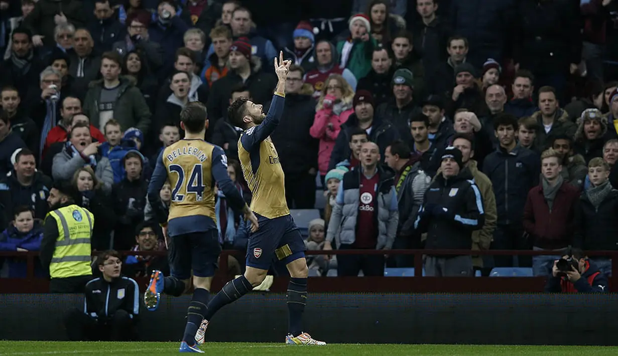 Striker Arsenal, Olivier Giroud, musim ini menampilkan produktivitas mencetak gol yang tinggi dibandingkan musim lalu. (AFP/Adrian Dennis)