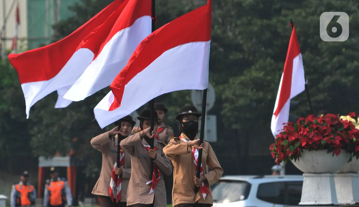 Berbagai elemen masyarakat, mulai dari pelajar, mahasiswa, pekerja, hingga komunitas-komunitas lokal, turut ambil bagian dalam upacara ini. (merdeka.com / Imam Buhori)