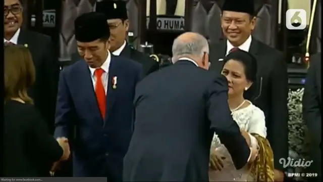 PM Australia Scott Morrison menyalami Presiden Jokowi. (Liputan6.com)
