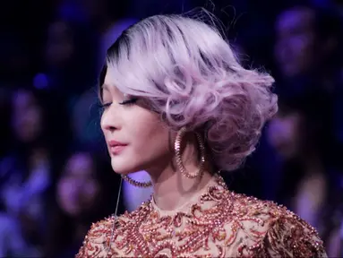 Inul Daratista merupakan penyanyi dangdut asal Pasuruan, Jawa Timur yang mulai dikenal publik dari aksi goyang ngebornya dari panggung hiburan rakyat. (Liputan.com/IG/@Inul.d)