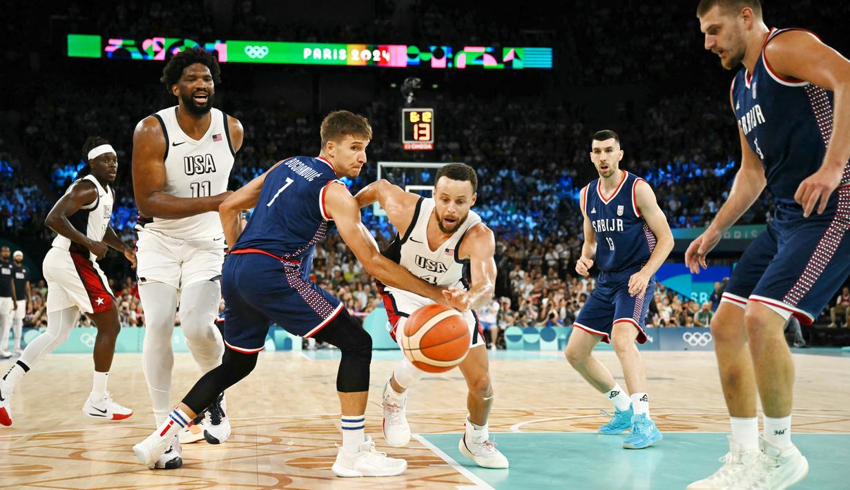 Kemenangan ini membawa AS akan bersua tuan rumah Prancis di final Olimpiade 2024. (AFP/Paul Ellis)