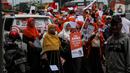 Antusias pendukung membawa poster saat menyambut kedatangan Anies Baswedan untuk menghadiri deklarasi Capres 2024 di Kantor DPP PKS, Jakarta, Kamis (23/2/2023). Anies Baswedan resmi diusung Majelis Syura Partai Keadilan Sejahtera (PKS) sebagai calon presiden (capres) pada Pilpres 2024. (Liputan6.com/Johan Tallo)
