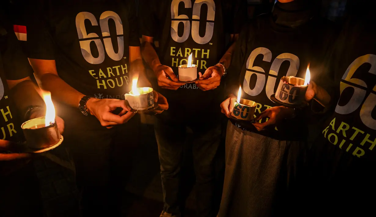 Earth Hour merupakan kampanye untuk mematikan lampu listrik selama satu jam lamanya. (JUNI KRISWANTO/AFP)