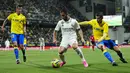 Meskipun dominan, Madrid baru bikin gol pada menit ke-72 dari aksi bek Nacho Fernandez. Setelah itu, Madrid menambah gol melalui aksi Marco Asensio pada menit ke-76. (AP Photo/Jose Breton)