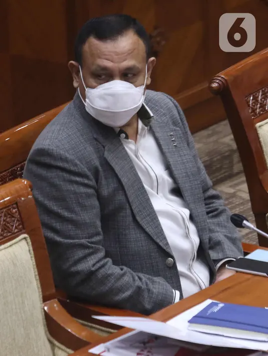 Ketua KPK Firli Bahuri menghadiri Rapat Dengar Pendapat (RDP) dengan Komisi III DPR di Kompleks Parlemen Senayan, Jakarta, Rabu (10/3/2021). Dalam rapat dengar tersebut, KPK dan Dewan Pengawas (Dewas) KPK membahas terkait dengan evalusasi pelaksanaan tugas dan fungsi KPK. (Liputan6.com/Angga Yuniar)