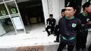 Sejumlah orang berjaga di depan kantor DPP Partai Persatuan Pembangunan (PPP), Jakarta, Rabu (3/12/2014). (Liputan6.com/Faizal Fanani)