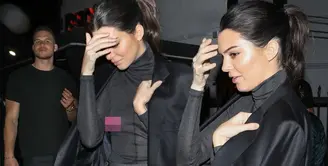 Kendall Jenner terlihat menggunakan jas Blake Griffin saat berkencan. Ia pun tertangkap tak menggunakan bra. (RadarOnline)