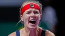 Petenis Belanda, Kiki Bertens berselebrasi setelah menang atas petenis Australia, Ashleigh Barty pada turnamen WTA Finals 2019 di Shenzhen, China, Selasa (29/10/2019). Bertens secara mengejutkan mengalahkan petenis peringkat satu dunia dengan 3-6, 6-3, 6-4 dalam waktu 2 jam 9 menit. (AP/Andy Wong)